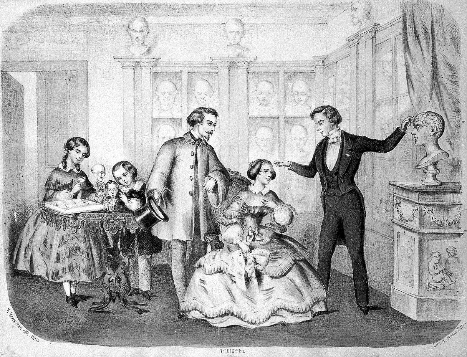 Lithograph depicting a phrenologist gesturing at a bust, while a man and woman observe. To the left, two girls examine dolls.